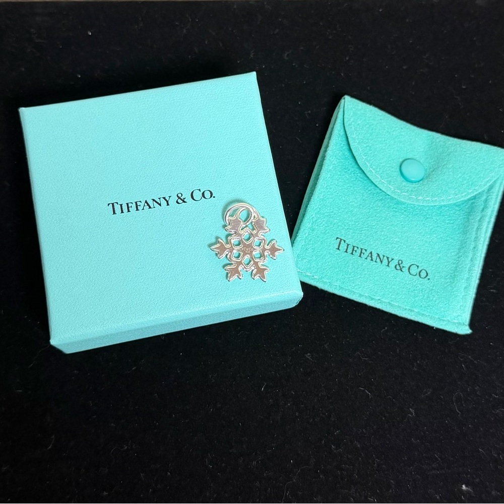 Retired- Tiffany & Co. Silver Snowflake Pendant